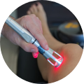 Laser therapy being used on a knee